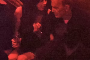 Kevin Costner Chats Up Mystery Woman at Raspoutine Night Club